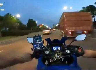 a motorcyclist hits a metal plate protruding from a parked truck