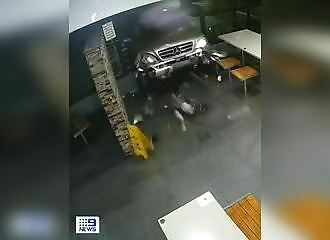 Man Drives Car into McDonald's in Shocking Attack on Girlfriend