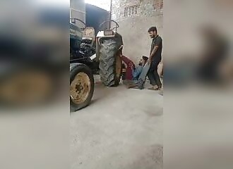 He tries to lift a tractor with his legs, it was a very bad idea (Warning - shocking)