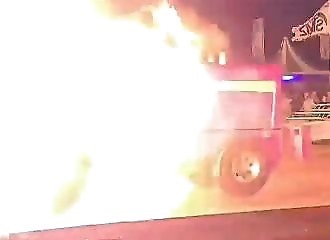 Tractor explodes during tractor pulling demonstration