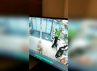 An individual attacks a store and the customers inside