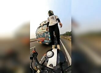 He gets hit by a truck during a motorcycle stunt