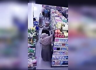 2 women caught stealing several boxes from a store