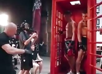 Boxing match in a telephone booth