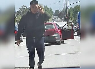 Karma for the man with the rat-tail haircut, who tries to assault a motorist