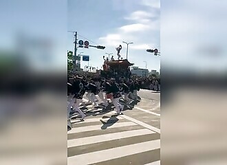 An artist falls at a festival in Japan