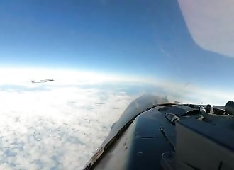F-16s follow a suspicious Russian bomber, and a Russian plane provokes them by passing just a few meters away