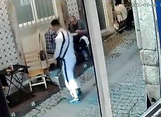 Two thieves caught stealing a woman's purse in a restaurant