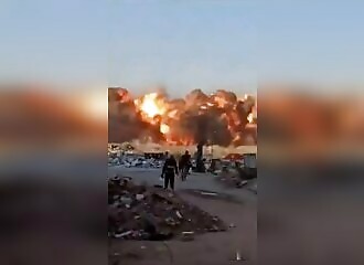 A civilian films an impressive air strike in Gaza
