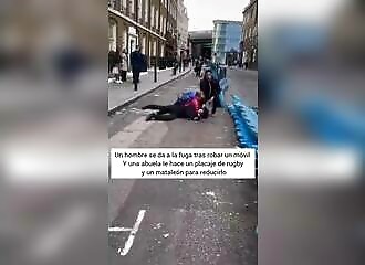 A man stealing a phone is stopped by the crowd (and a grandmother)