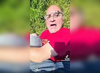 An elderly man assaults a Tiktok performer and is quickly calmed down
