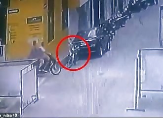 A motorcycle bomb explodes and narrowly misses killing two people