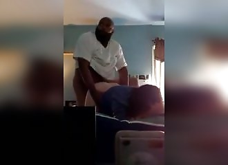 My black neighbour is putting it on while I'm at work